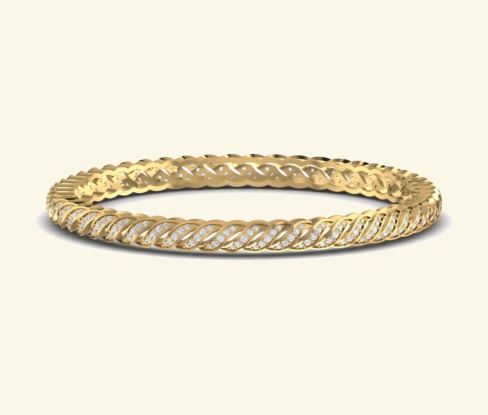 Textured diamond bangle with low-profile woven gold silhouette. — 17.55 GM gold
