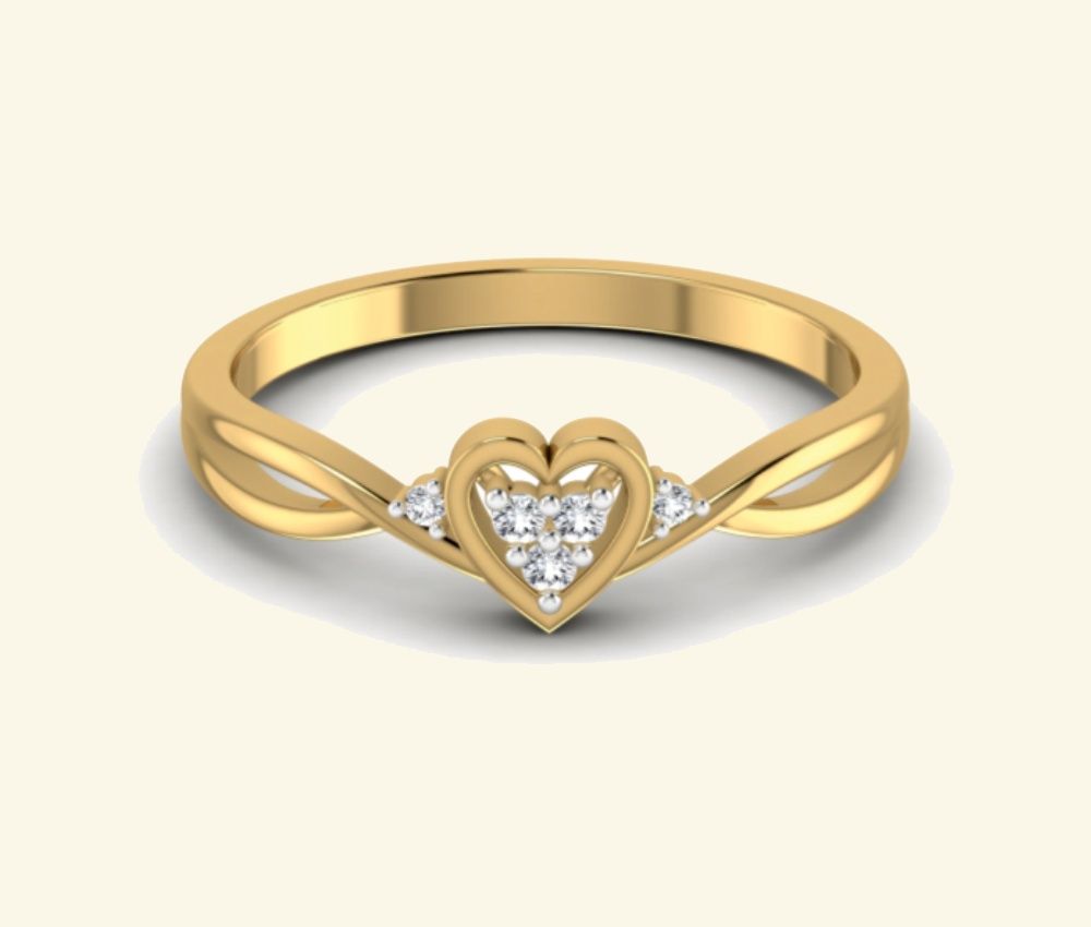 Heart-form diamond ring with central pavé cluster. — 2.92 GM gold
