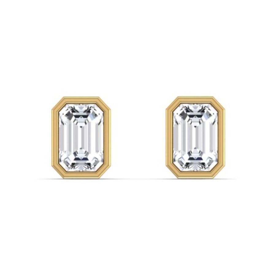 Bezel-set emerald-cut diamond stud earrings. — 1.85 GM gold