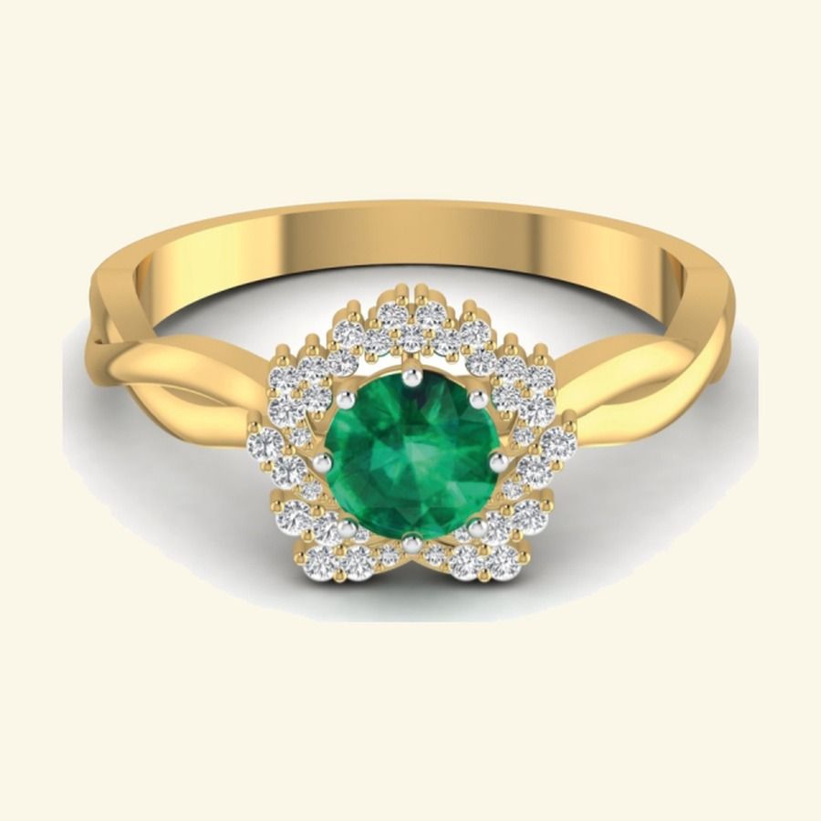 Pear emerald centre with diamond cluster halo and split-shoulder shank. — 3.83 GM gold