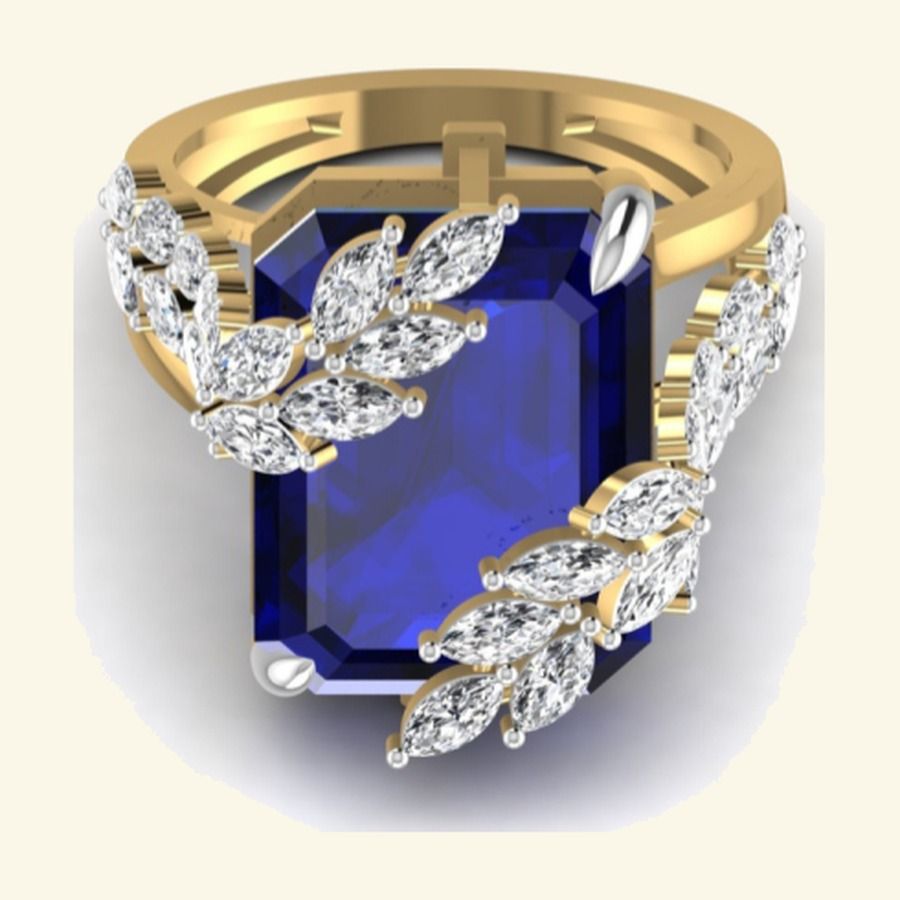 Emerald-cut sapphire centre with starburst pear cluster halo. — 5.90 GM gold
