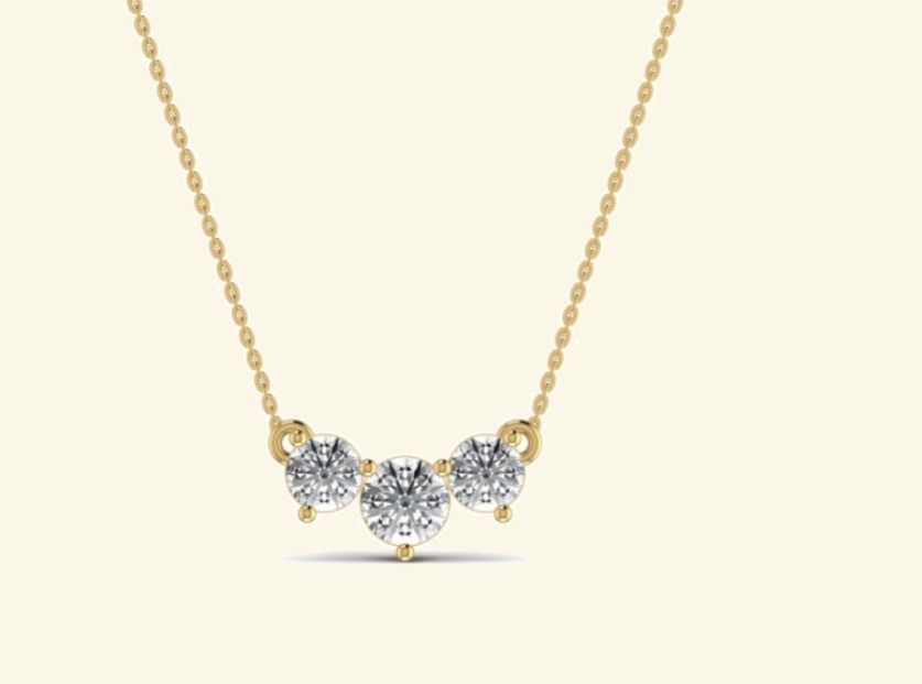 Three-stone graduated round bar pendant on cable chain. — 3.05 GM gold