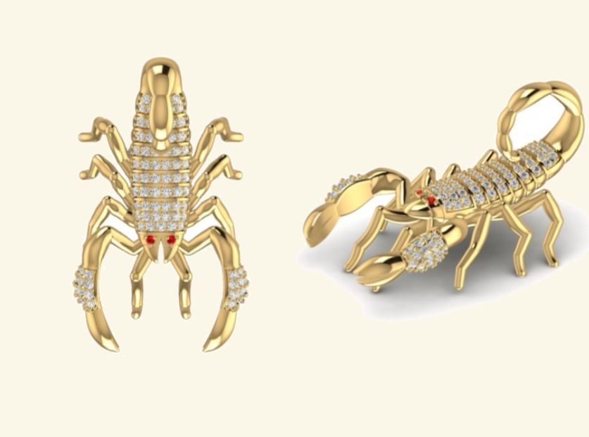 Pavé scorpion pendant pair with pavé back and ruby eye accents. — 12.33 GM gold